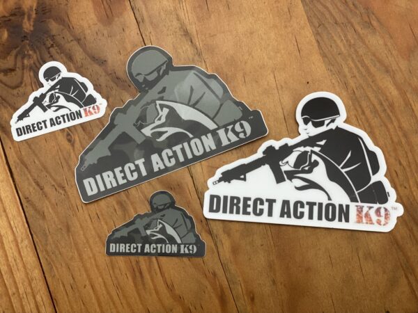 Direct Action K9 stickers on the table