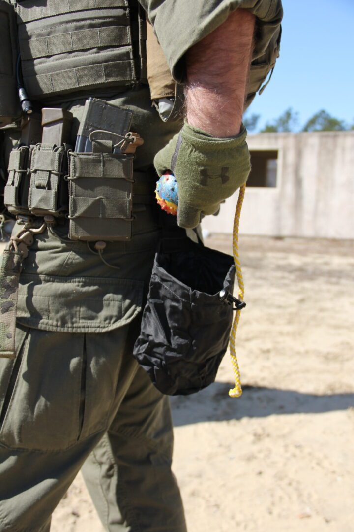 Tactical gear with glove and pouch