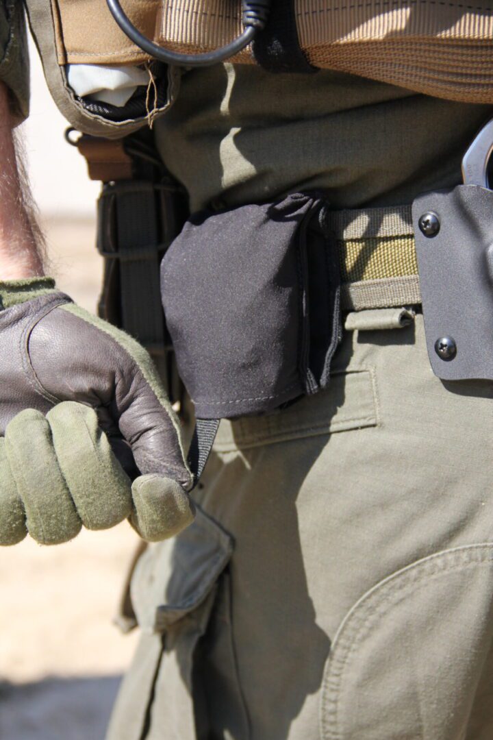 Tactical gear and gloves close-up